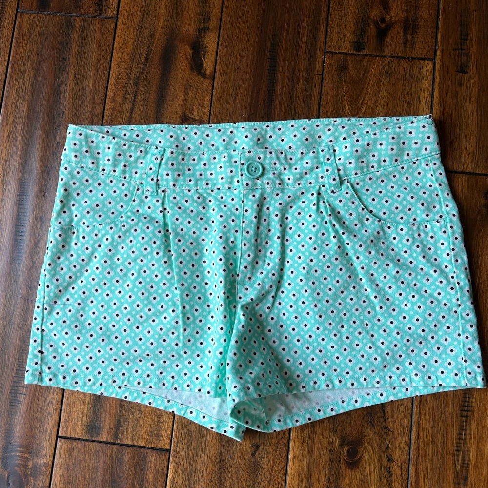 Floral turquoise Cherokee jean shorts.